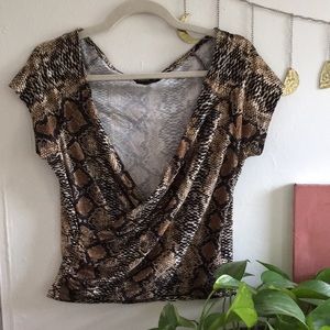 Sassy snake print low neck wrap around top